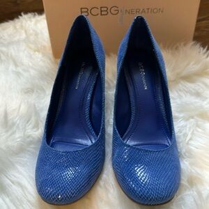 New in box!  BCBGeneration pumps, blue, size 8.5